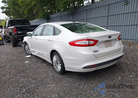 2015 Ford Fusion Hybrid Se z USA, uszkodzony, nr VIN 3FA6P0LU4FR202410